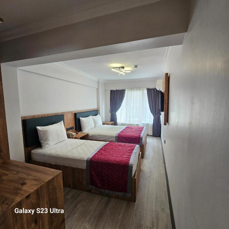 Postel nebo postele na pokoji v ubytování old hatay hotel