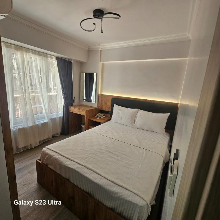 Postel nebo postele na pokoji v ubytování old hatay hotel