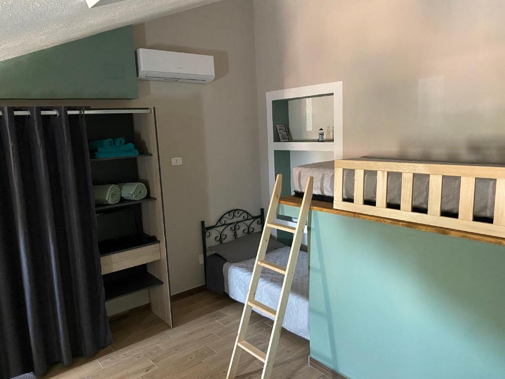Letto o letti in una camera di La terrazza nel borgo