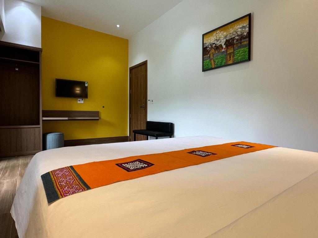Giường trong phòng chung tại Ha Giang Hostel