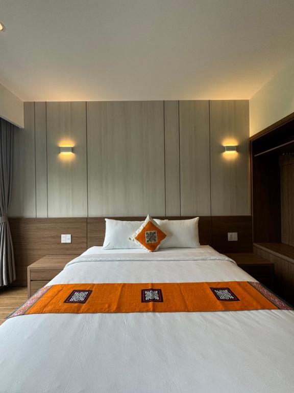 Giường trong phòng chung tại Ha Giang Hostel