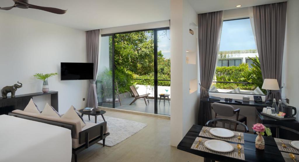 TV a/nebo společenská místnost v ubytování Eightfold Urban Resort