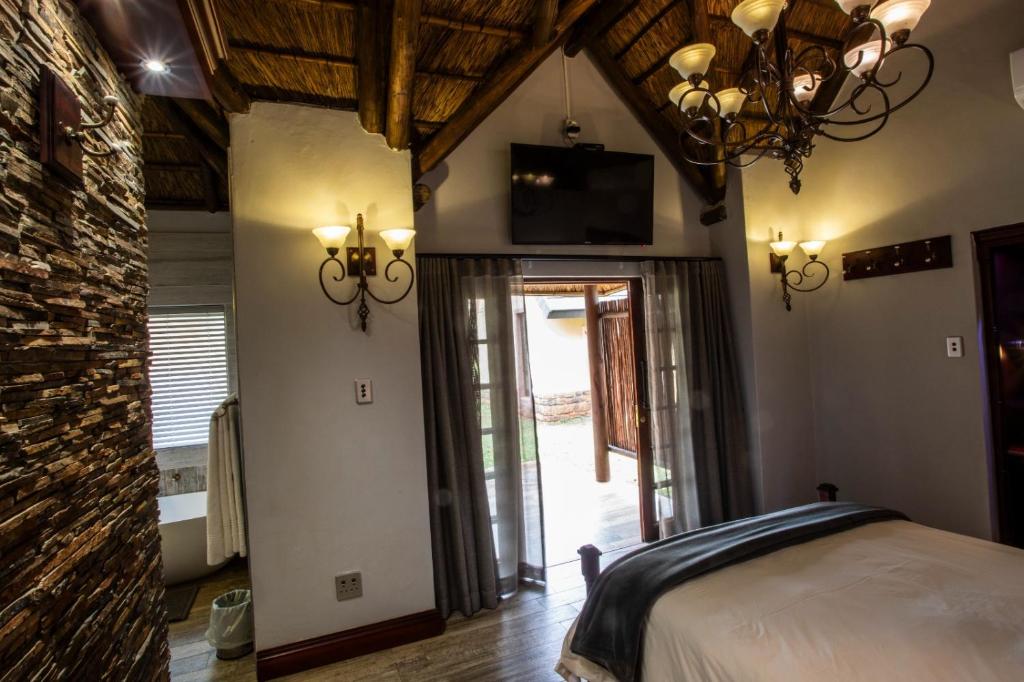 Postel nebo postele na pokoji v ubytování Lapeng Guest Lodge