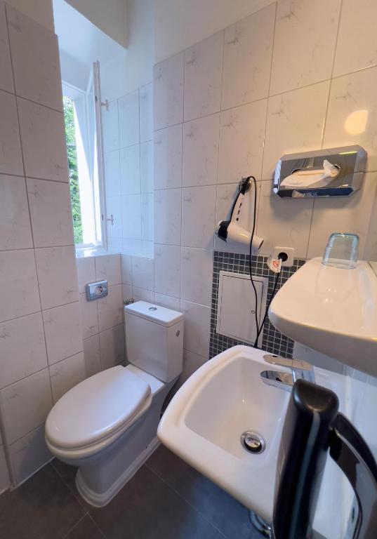 Koupelna v ubytování Hotel-Maison Am Olivaer Platz