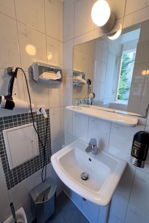 Koupelna v ubytování Hotel-Maison Am Olivaer Platz