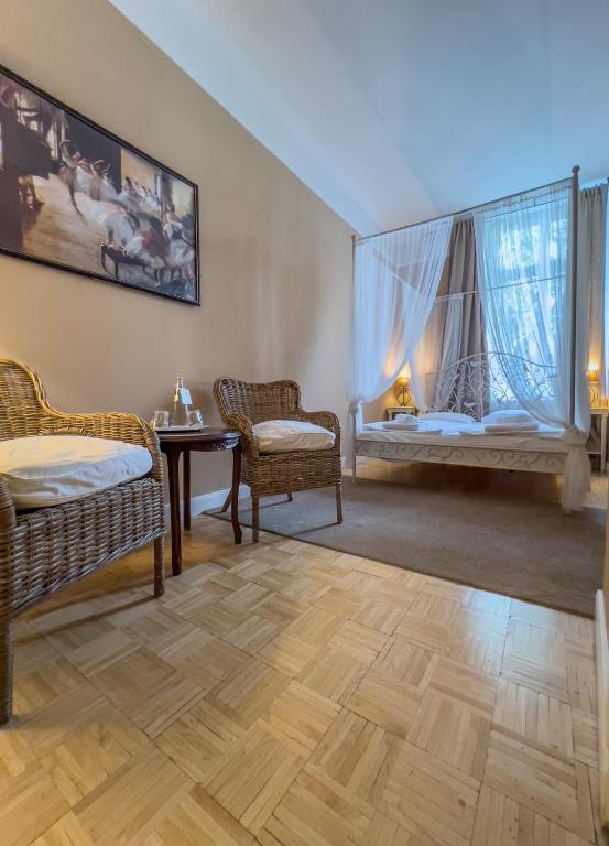 Postel nebo postele na pokoji v ubytování Hotel-Maison Am Olivaer Platz