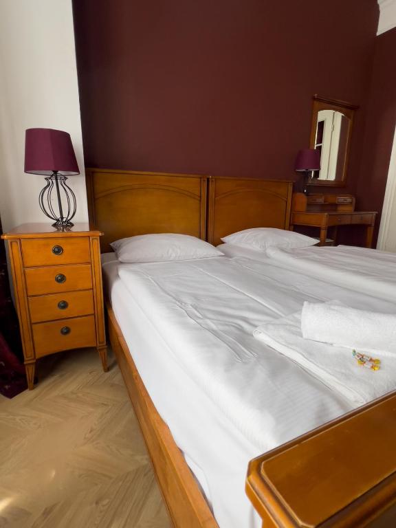 Postel nebo postele na pokoji v ubytování Hotel-Maison Am Olivaer Platz