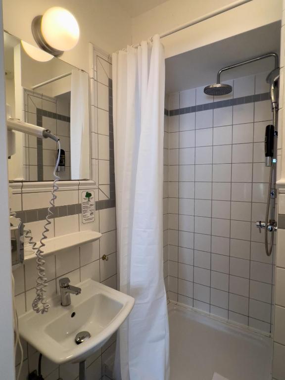 Koupelna v ubytování Hotel-Maison Am Olivaer Platz