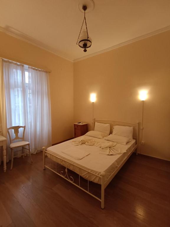 Postel nebo postele na pokoji v ubytování Anesis Hotel
