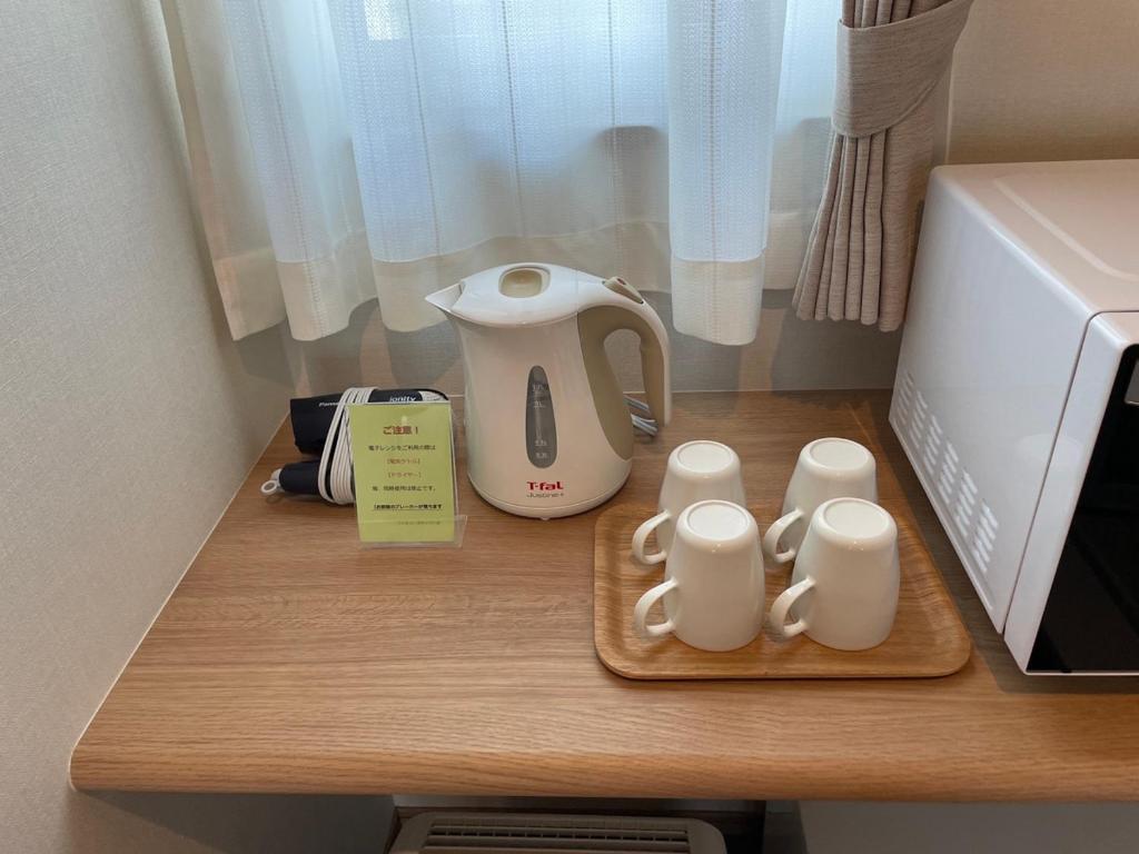 Příslušenství pro přípravu čaje a kávy v ubytování Family Stay Tsukuba Room