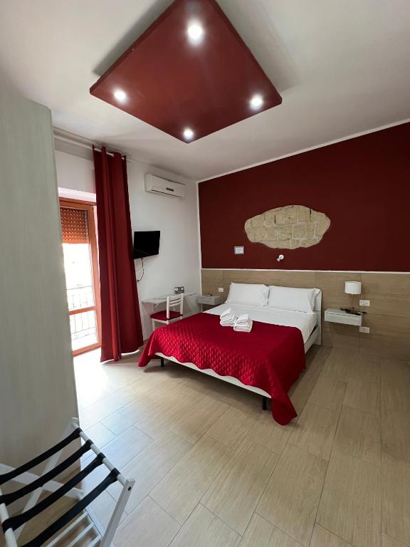 A bed or beds in a room at Napoli Central Gate