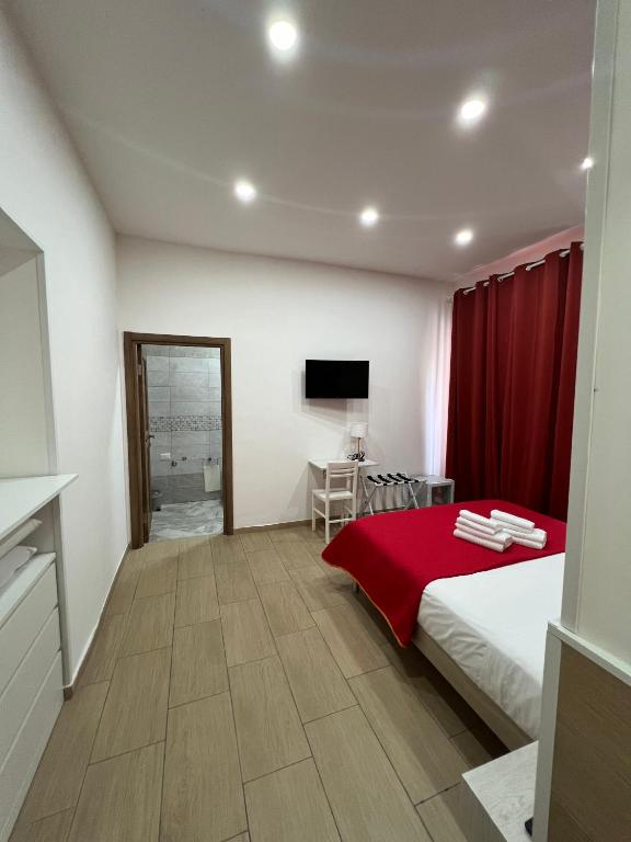 A bed or beds in a room at Napoli Central Gate