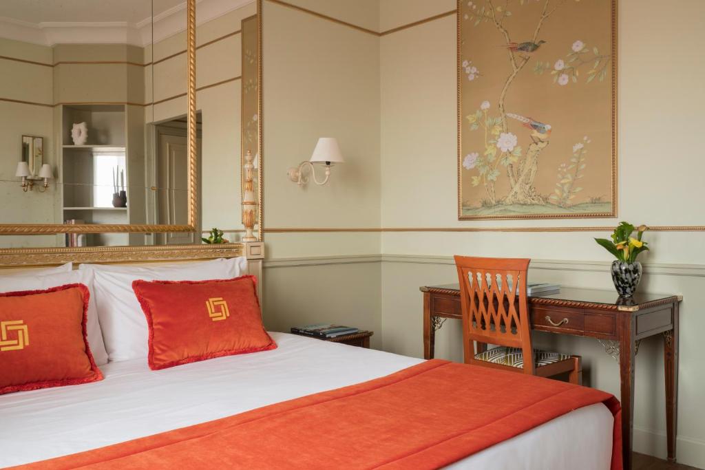 Postel nebo postele na pokoji v ubytování Hotel Degli Aranci