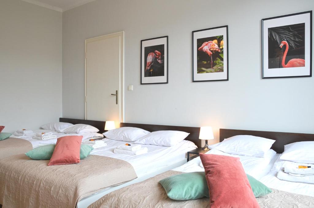 Posteľ alebo postele v izbe v ubytovaní Unique apartments Krasinskiego street