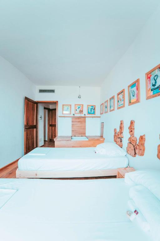 Postel nebo postele na pokoji v ubytování Ostello Bello Assisi Bevagna