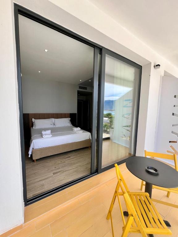 Postel nebo postele na pokoji v ubytování KAAN Hotel