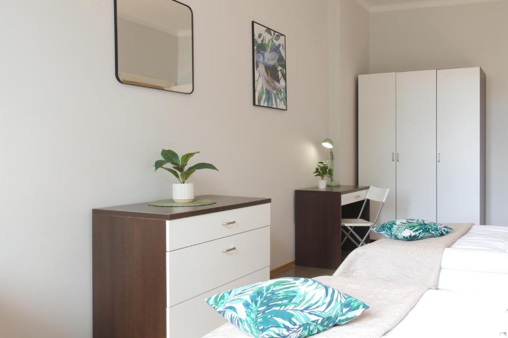 Posteľ alebo postele v izbe v ubytovaní Unique apartments Krasinskiego street