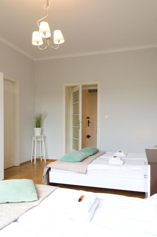 Posteľ alebo postele v izbe v ubytovaní Unique apartments Krasinskiego street
