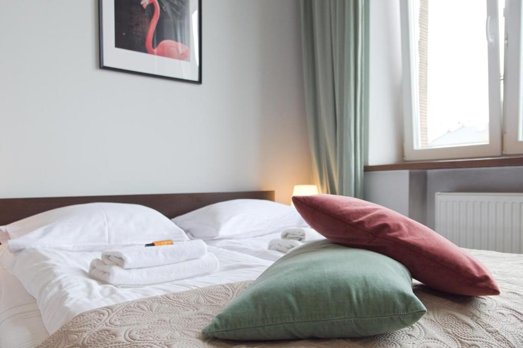 Posteľ alebo postele v izbe v ubytovaní Unique apartments Krasinskiego street