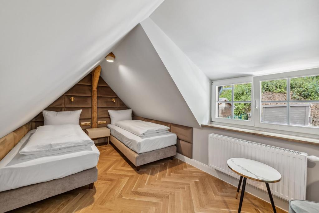Postel nebo postele na pokoji v ubytování Residenz Hugo