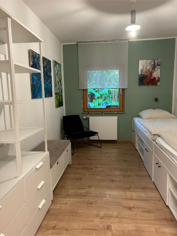 Postel nebo postele na pokoji v ubytování Fuchsbau-Goldbach