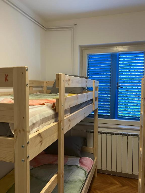 Postel nebo postele na pokoji v ubytování Sea House N1