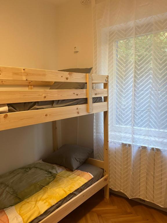 Postel nebo postele na pokoji v ubytování Sea House N1