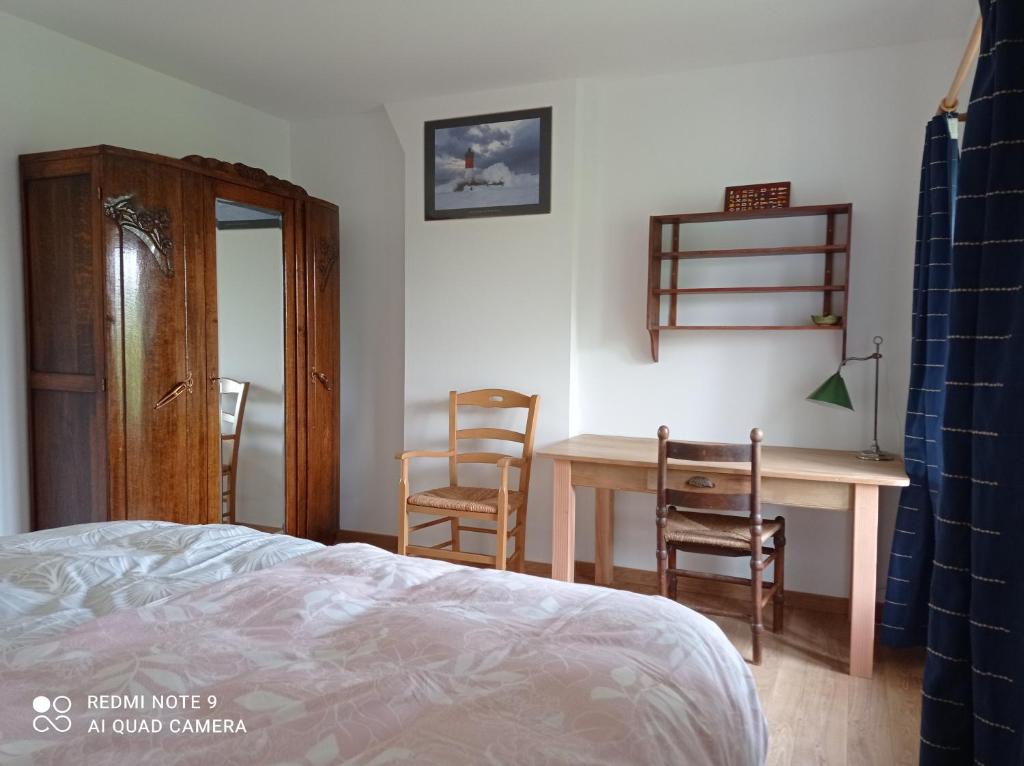 Postel nebo postele na pokoji v ubytování Chez Hubert