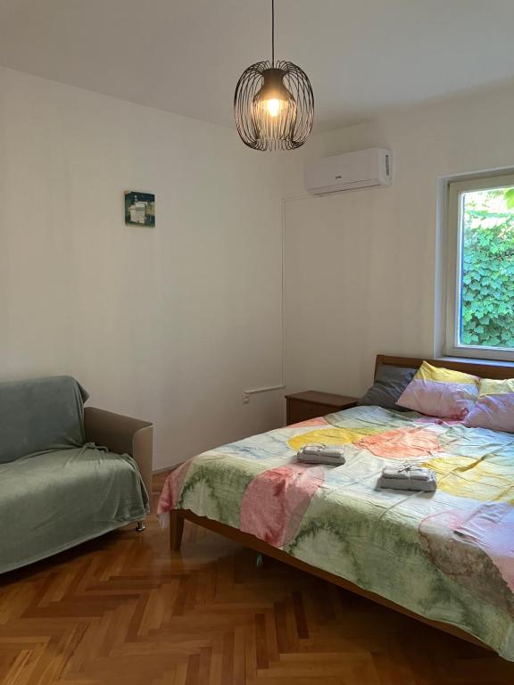 Postel nebo postele na pokoji v ubytování Sea House N1