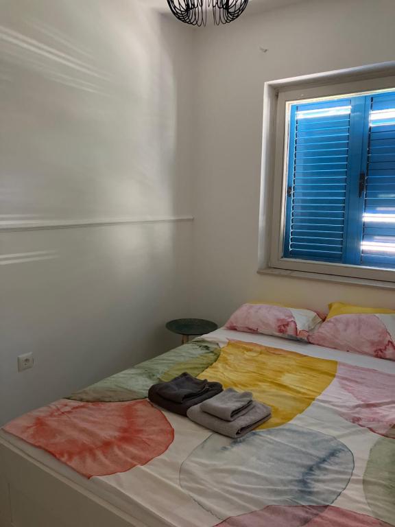 Postel nebo postele na pokoji v ubytování Sea House N1