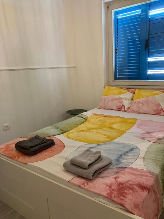 Postel nebo postele na pokoji v ubytování Sea House N1