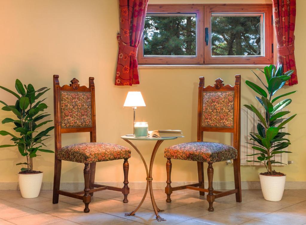 Posezení v ubytování Albergo Il Giardino del Rio
