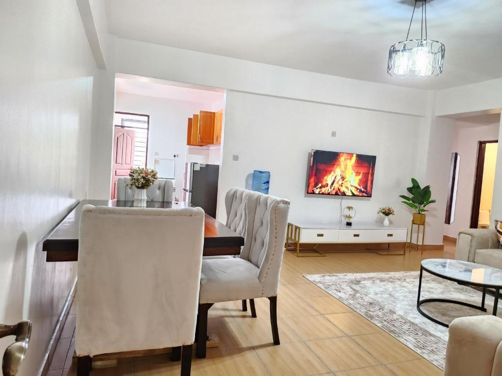 TV a/nebo společenská místnost v ubytování Jay's apartment