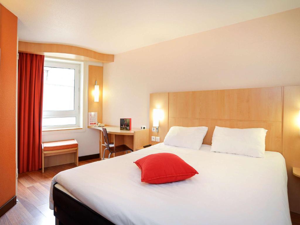 Postel nebo postele na pokoji v ubytování ibis Toulouse Centre