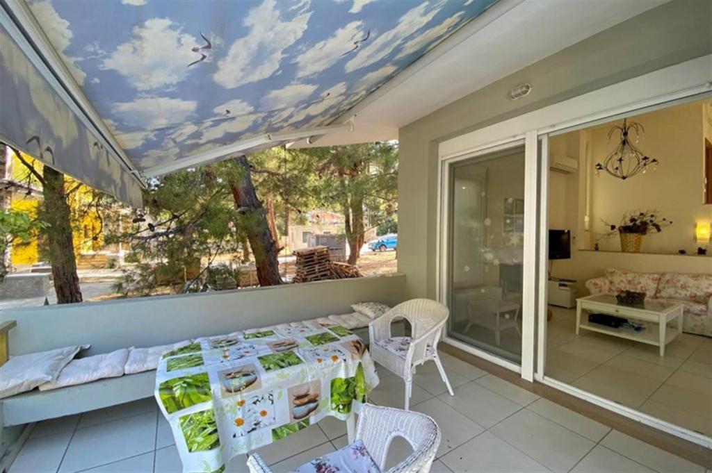 A balcony or terrace at Helios Villa Sea Front - 3 bedrooms 7 guests