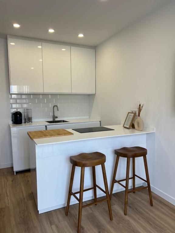 Køkken eller tekøkken på Playa Chica Luxury Apartament