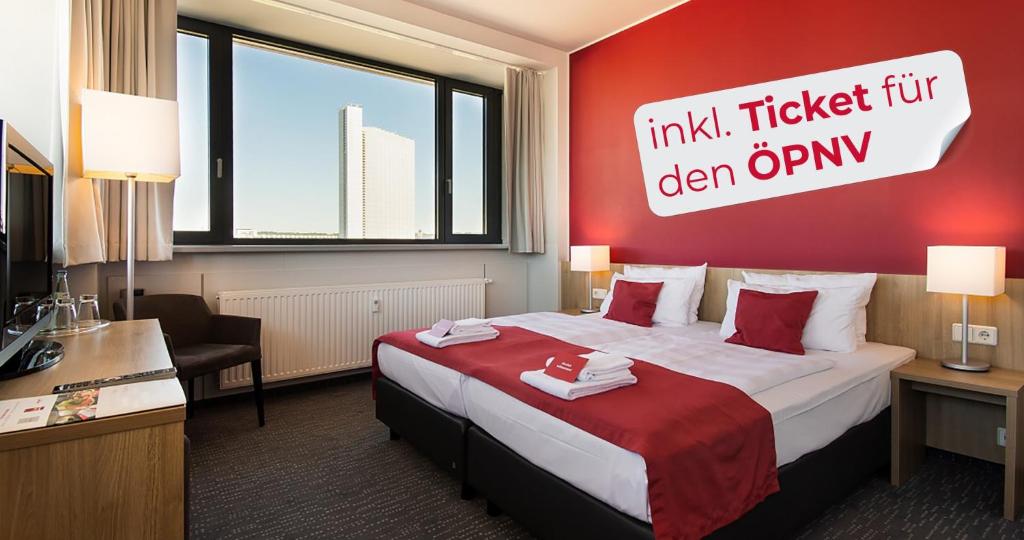 Postel nebo postele na pokoji v ubytování Biendo Hotel