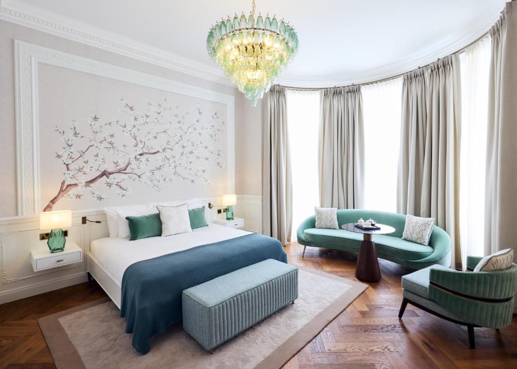 Postel nebo postele na pokoji v ubytování 2 Chesham Hotel