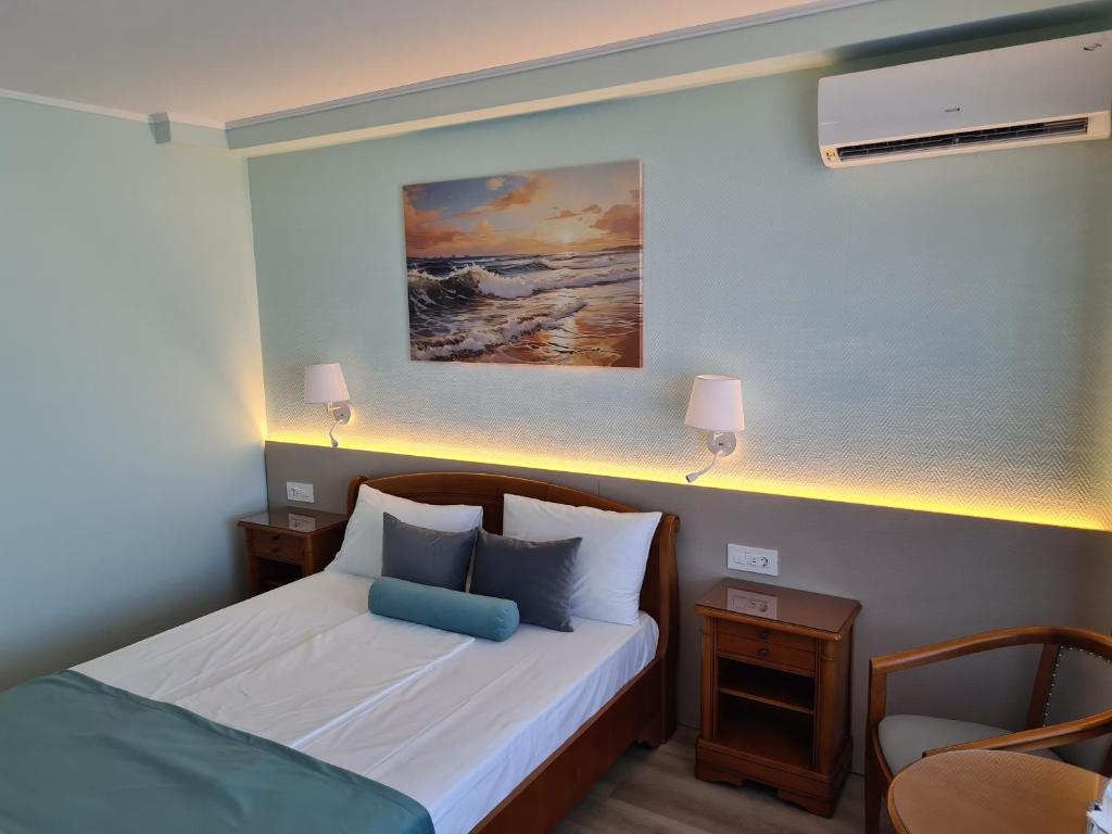 Postel nebo postele na pokoji v ubytování Hotel Comandor