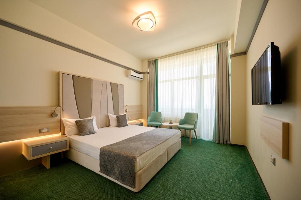 TV a/nebo společenská místnost v ubytování Hotel Malibu