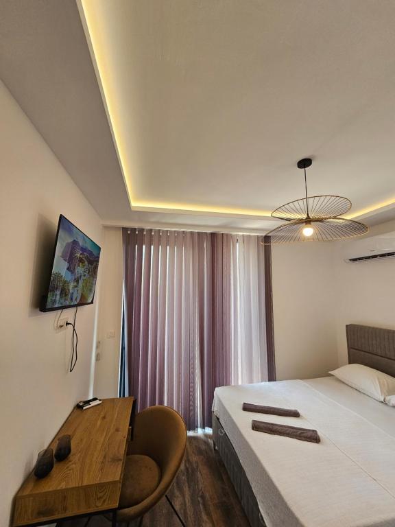 TV a/nebo společenská místnost v ubytování La Vida Apartments