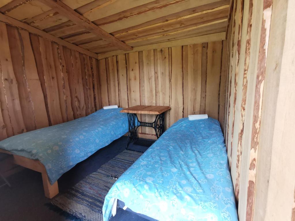 Postel nebo postele na pokoji v ubytování Päikesekivi Keskus