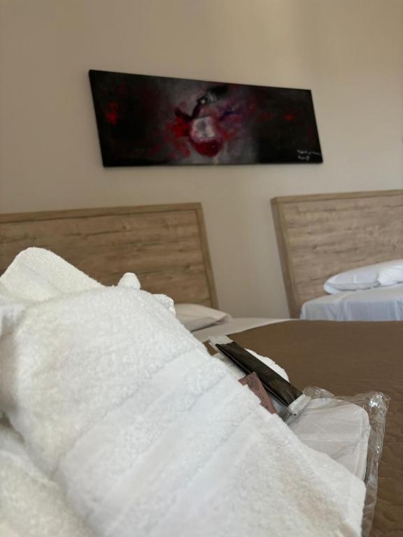 Postel nebo postele na pokoji v ubytování Masseria Spinale Wine Resort