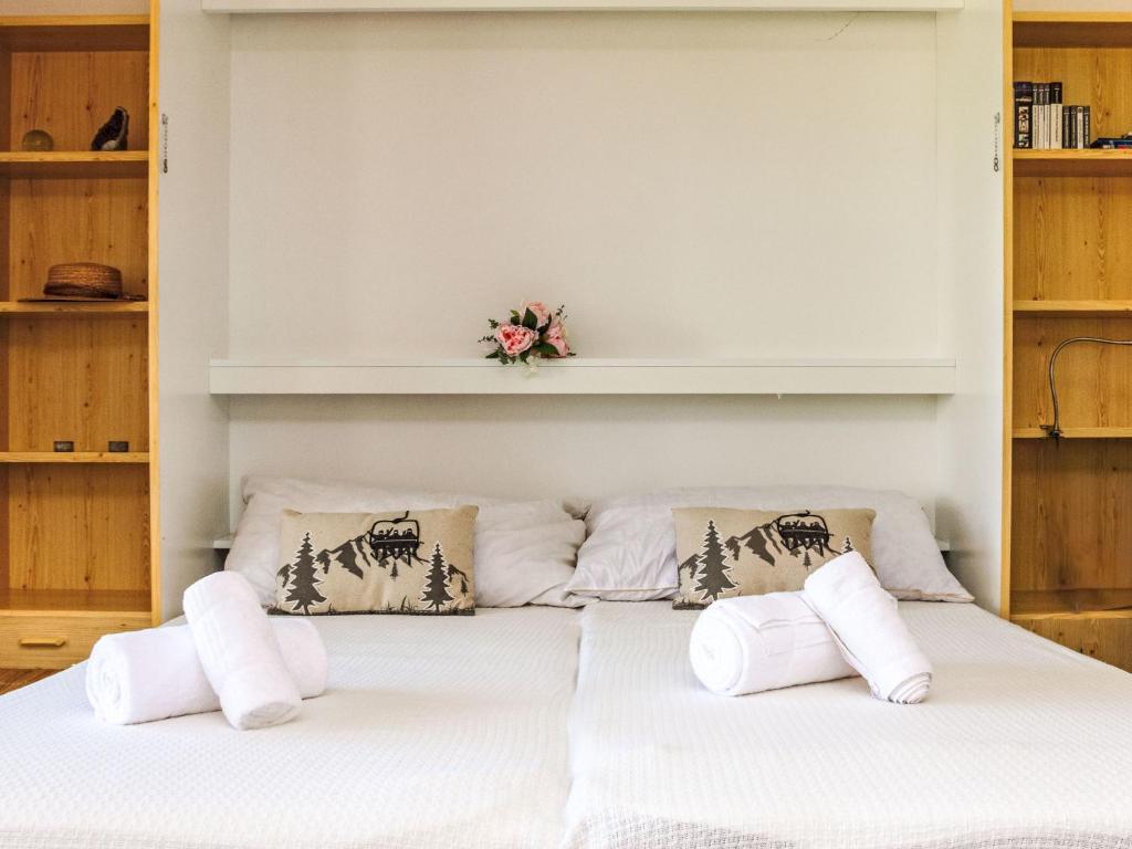 Postel nebo postele na pokoji v ubytování Apartment Ambassador II Apt 13 by Interhome