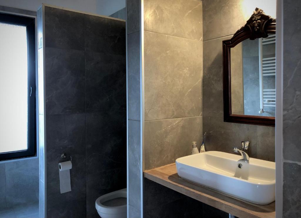 Koupelna v ubytování Lokokina Guesthouse