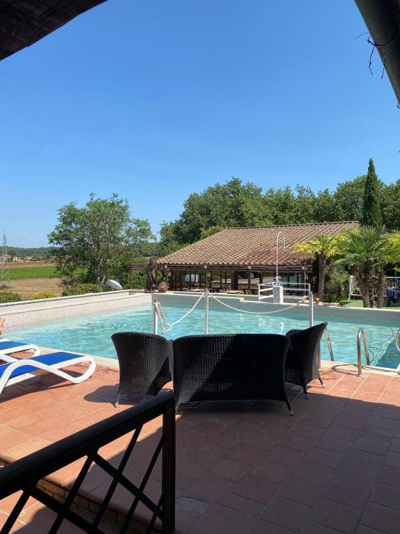 Bazén v ubytování Hotel Il Pietreto nebo v jeho okolí
