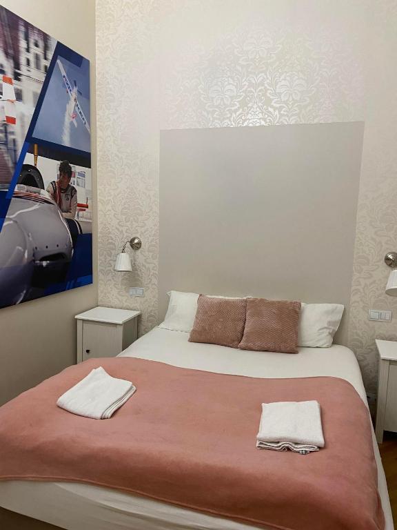Postel nebo postele na pokoji v ubytování The Cream