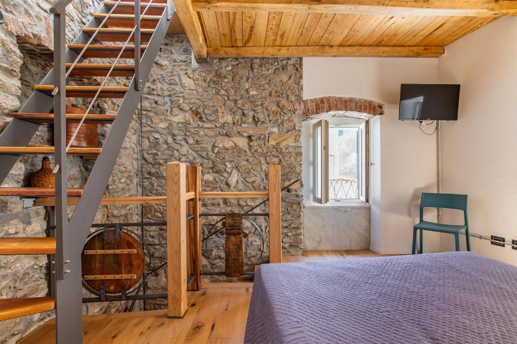 Postel nebo postele na pokoji v ubytování Pasini Luxury room,cozy winemakers retreat
