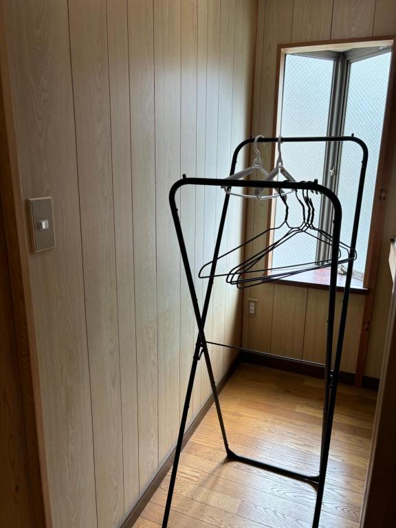 Postel nebo postele na pokoji v ubytování まち宿門