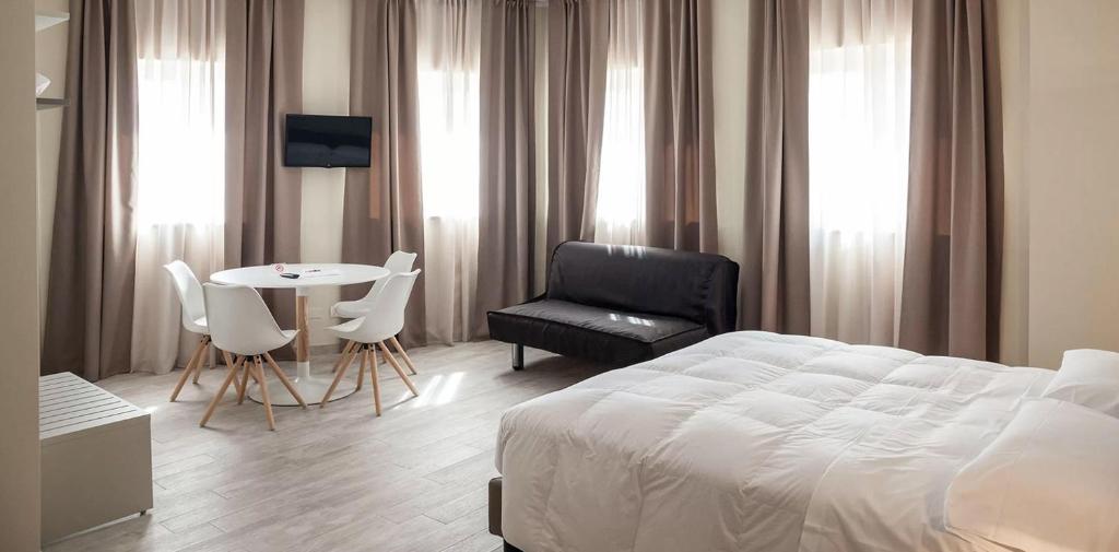 Posteľ alebo postele v izbe v ubytovaní Hotel & Wellness Stella Delle Langhe